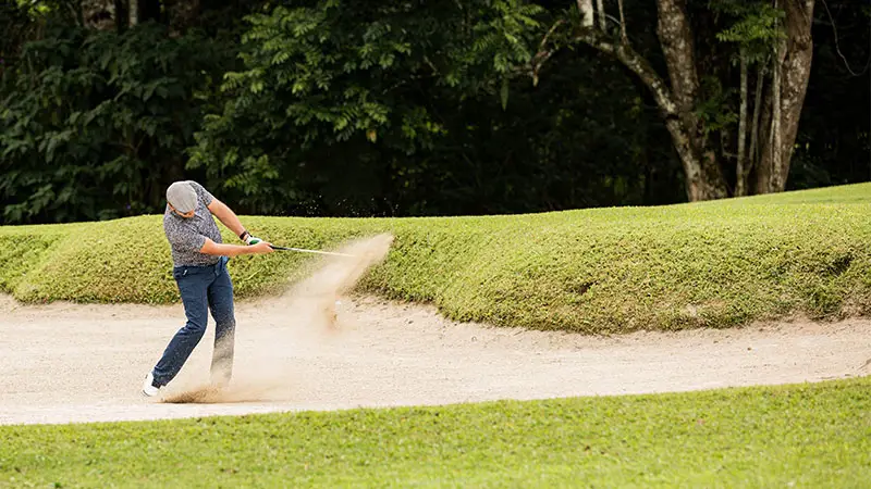 Use Different Clubs Based on Bunker Condition