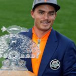 why does rickie fowler wear orange