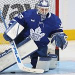 hockey goalies scrape the ice