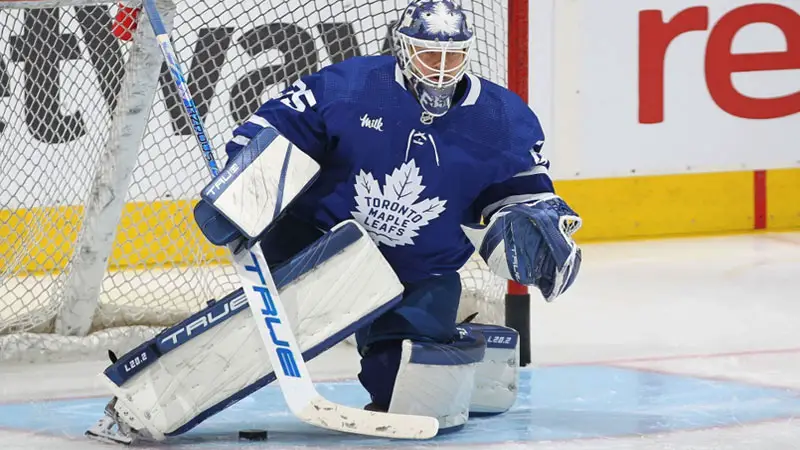 hockey goalies scrape the ice